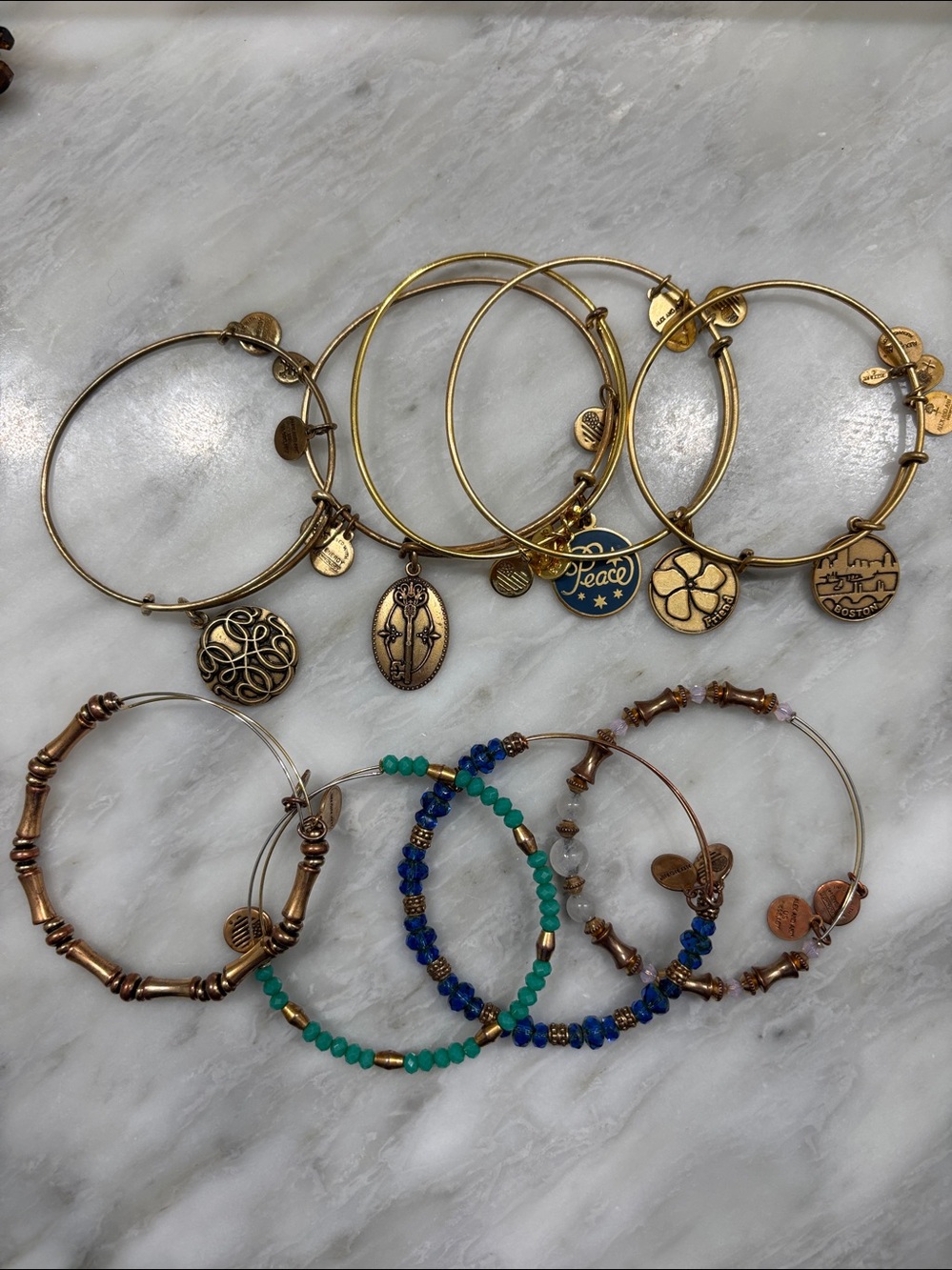 Alex and Ani Gold Charm Bangles 
9 bracelets